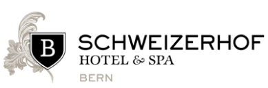 Sleek logo of a shield and leaf in grayscale, representing stability and growth in the finance or legal sectors.