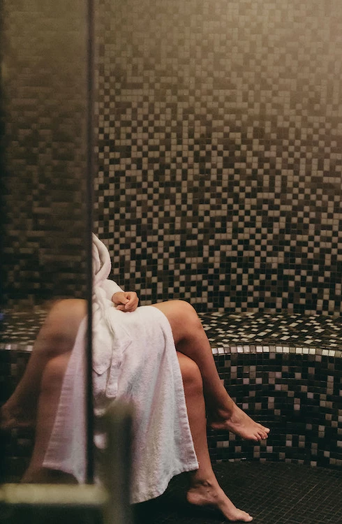 Serene golf course with lush greens and a sand bunker, perfect for golf enthusiasts seeking tranquility and challenge.