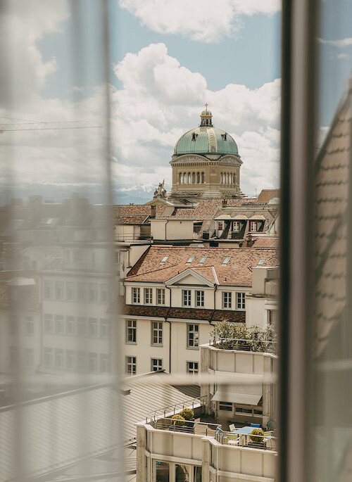 Calming massage session depicted with soft brown and neutral tones, promoting relaxation and wellness in a serene spa setting.